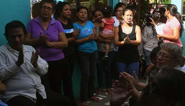 Relatives and friends mourn during the wake of Teiler Lorio, 15, who died during an attack by riot police and members of the Sandinista Youth in the neighborhood of Las Americas 1, in Managua.