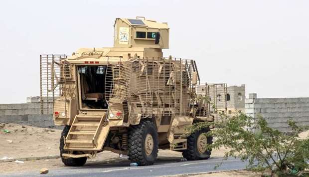 An armoured vehicle belonging to the Amalqa (,Giants,) Brigades, loyal to the Saudi-backed government, parked on the side of a road during the offensive to seize the Red Sea port city of Hodeida.
