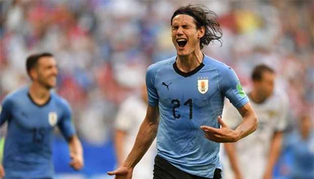 Uruguay's forward Edinson Cavani celebrates after scoring a goal during the Russia 2018 World Cup Group A match against Russia at the Samara Arena in Samara on Monday.
