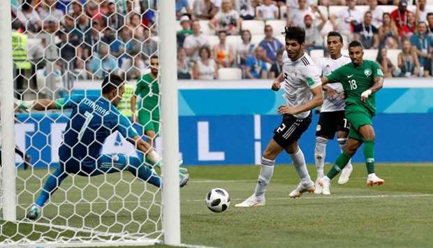Saudi Arabia's Salem Al-Dawsari scores their second goal against Egypr