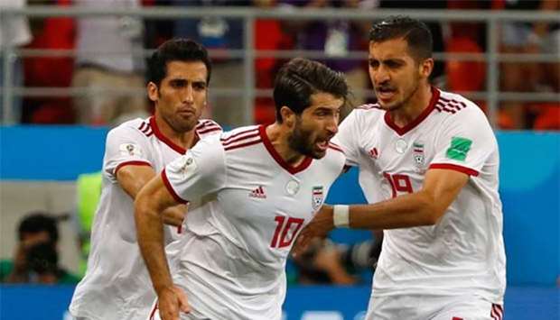 Iran's forward Karim Ansari Fard celebrates scoring his team's equaliser during the Group B match against Portugal at the Mordovia Arena in Saransk on Monday.