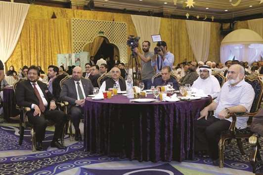 GATHERING: The distinguished guests at the fund-raising event.