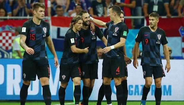 Croatia's Milan Badelj celebrates scoring their first goal with team mates