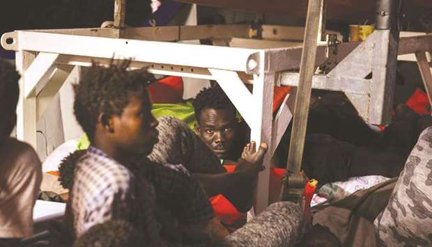 This handout picture taken and released on Monday by German NGO u2018Mission Lifelineu2019 off the coast of Malta shows migrants on board the Lifeline ship.