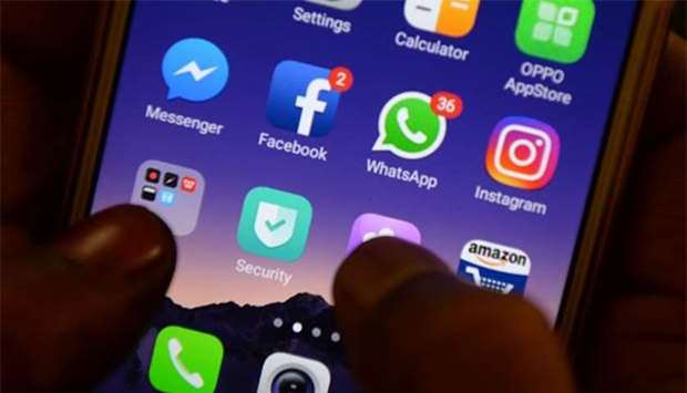 Apps for WhatsApp, Facebook, Instagram and other social networks are seen on a smartphone in Chennai. Indian police have urged people not to believe false rumours on WhatsApp.