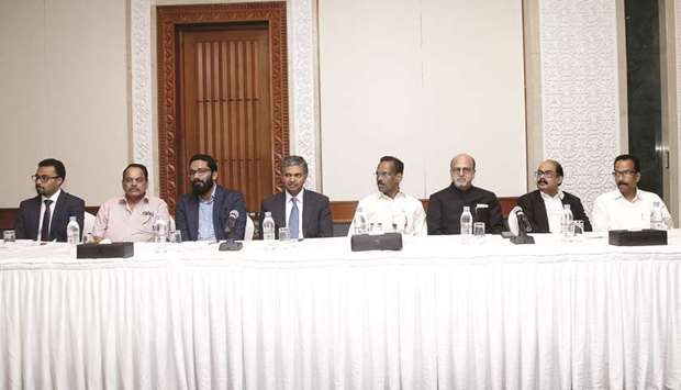 Kerala Minister for Excise and Labour T P Ramakrishnan (fourth right) and Indian ambassador P Kumaran at a reception held in honour of the minister in Doha yesterday.  Also seen are (from left) J K Menon, Dr K C Chacko, Dr Sreeram Venkitraman, Dr R Seetharaman, C V Rappai and K K Sankaran. PICTURE: Jayaram