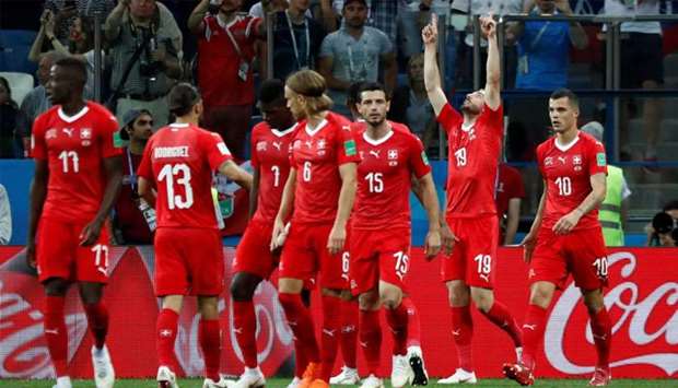 Switzerland's Josip Drmic celebrates scoring their second goal with team mates