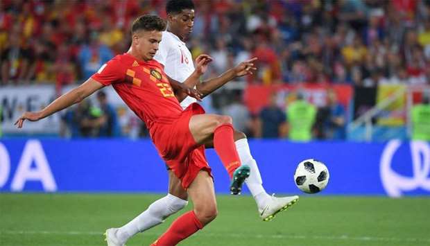 Belgium's midfielder Leander Dendoncker (L) vies with England's forward Marcus Rashford during the Russia 2018 World Cup Group G football match against England