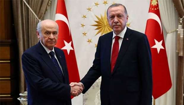 President Recep Tayyip Erdogan shaking hands with Devlet Bahceli, leader of the Nationalist Movement Party (MHP) in Ankara on Wednesday.