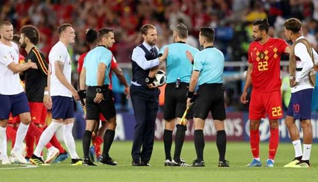 England manager Gareth Southgate shakes hands with match officials after the game against Belgium on Thursday.