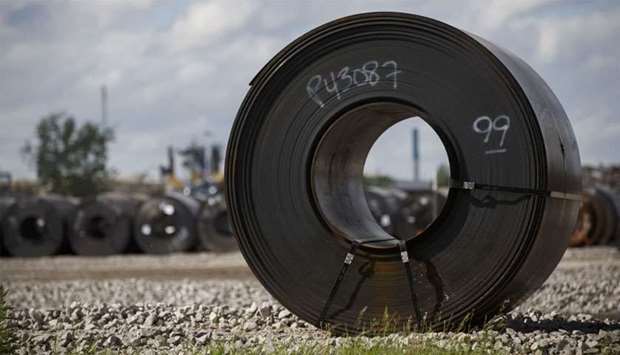 Steel coils lay in a yard at ArcelorMittal Dofasco steel plant in Hamilton, Canada