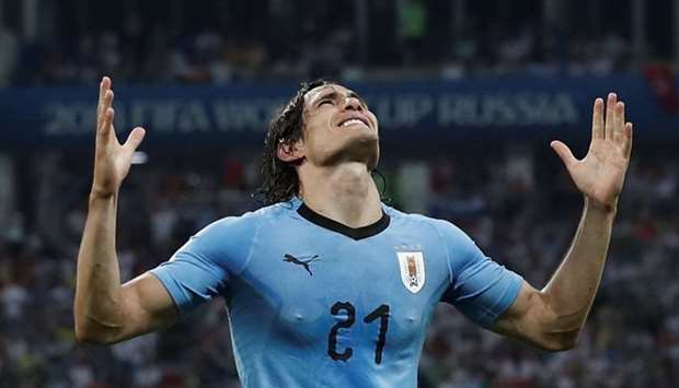 Uruguay's Edinson Cavani celebrates scoring their second goal
