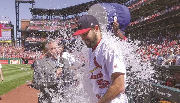 St. Louis Cardinals starting pitcher Michael Wacha is doused with water after pitching a one hitter into the ninth inning against the Pittsburgh Pirates at Busch Stadium. PICTURE: USA TODAY Sports