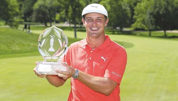 Bryson DeChambeau poses with the trophy after winning The Memorial Tournament in Dublin, Ohio. (Getty Images/AFP)