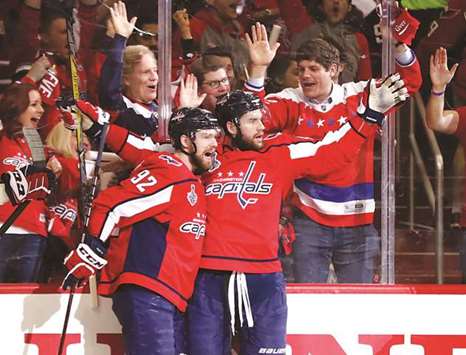 Washington Capitals right wing Tom Wilson (right) celebrates with center Evgeny Kuznetsov after scoring a goal against the Vegas Golden Knights in the first period in game four of the 2018 Stanley Cup Final at Capital One Arena. PICTURE: USA TODAY Sports