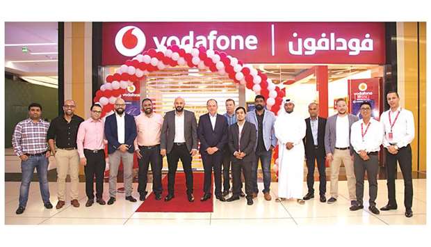 Vodafone Qatar officials and other dignitaries during the opening of a retail store at Tawar Mall.