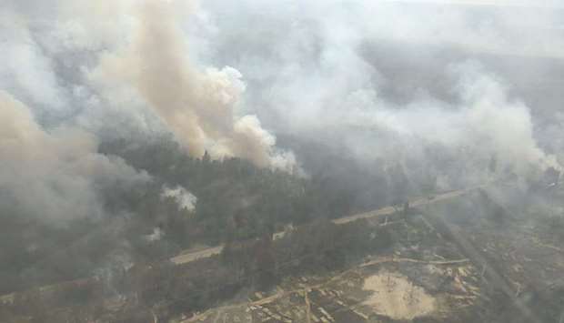 This handout picture taken and released by Ukrainian emergency ministry press service shows the wildfire which has broken out at the exclusion zone around the Chernobyl nuclear power station.