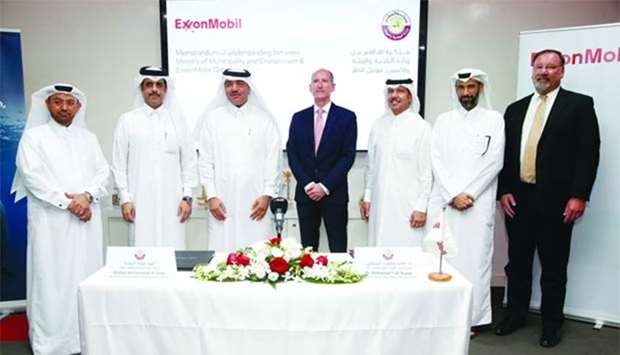 HE the Minister of Municipality and Environment Mohamed bin Abdullah al-Rumaihi, ExxonMobil Qatar president and general manager Alistair Routledge and other officials at the signing ceremony on Thursday. PICTURE: Jayaram