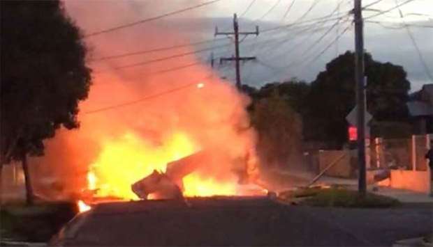 The light aircraft burst into flames after crashing in a suburban street in Melbourne. Picture: Twitter