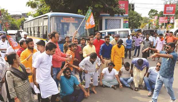 Supporters of the Bharatiya Janata Party (BJP) shout slogans as they block a road during a protest against the recent killings at Sandeshkhali in West Bengal, in Siliguri yesterday.