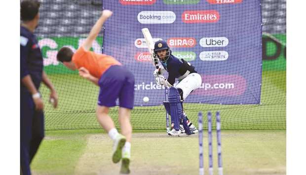 Sri Lankau2019s player Kusal Mendis (right) bats in the nets in Bristol, England, on Sunday. (AFP)