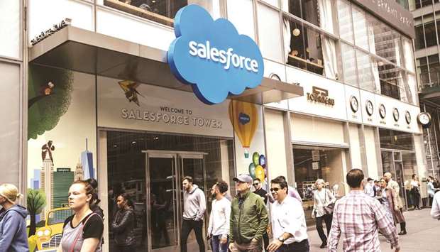 Pedestrians pass in front of the Salesforce Tower in New York. The takeover of Tableau will be Salesforceu2019s largest deal to date, according to data compiled by Bloomberg.