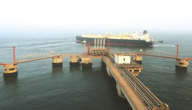 An LNG tanker leaves the dock after discharging at PetroChinau2019s receiving terminal in Dalian, Liaoning province, China (file). To meet its growing import needs, the Asian country will become the largest buyer of liquefied natural gas by 2024, overtaking Japan, according to the IEA.