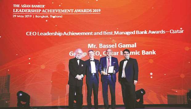 Gamal (second right) receives the u2018Asian Banker Leadership Achievement Award 2019u2019 at the Asian Banker Leadership Achievement Awards ceremony held in Bangkok recently.