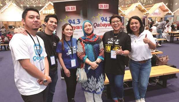 THE TEAM: From left: RJ Pau (weekdays 12-3pm), RJ Francis (weekdays 3-6pm), RJ Ria (In Training), a visitor, RJ Chloe (weekday 8-12noon) and Meech del Carmen.