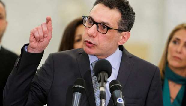 Freed Lebanese businessman Nizar Zakka, who had been detained in Iran since 2015, gestures during a news conference at the Presidential Palace in Baabda, Lebanon