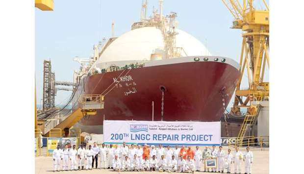N-KOM team posing with  LNG vessel u2018Al Khoru2019 at Erhama bin Jaber Al Jalahma Shipyard.