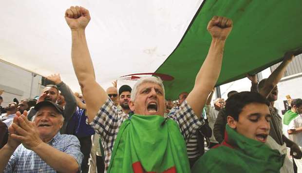 A man gestures during an anti-government protest in Algiers, yesterday.