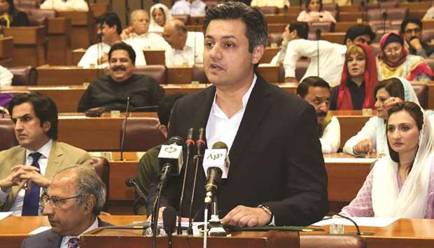 Pakistan Minister of State for Revenues Hammad Azhar speaks as he presents the budget for the year 2019-20 in the National Assembly, in Islamabad yesterday.