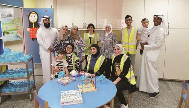 Ooredoo Kuwait volunteers celebrate Garangao with children at Ibn Sina Hospital.