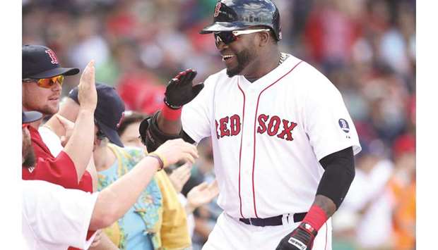 In this September 22, 2013, picture, Boston Red Sox designated hitter David Ortiz celebrates his solo home in the game against Toronto Blue Jays in Boston, United States. (Reuters)