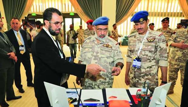 HE Chief of Staff of the Armed Forces Lieutenant General (Pilot) Ghanem bin Shaheen al-Ghanem joins some of the delegates at the conference inauguration.