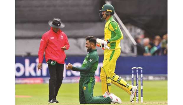 Pakistanu2019s Mohamed Amir (C) celebrates his fifth wicket against Australia at The County Ground in Taunton yesterday.