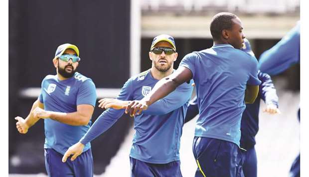 South Africa captain Faf du Plessis (centre) has found promise in his teamu2019s disciplined bowling in the opening match against England on Thursday. (AFP)