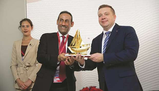 Qatar Chamber board member Ali Abdul Latif al-Misnad hands over a token of recognition to Roscongress Foundation CEO Alexander Stuglev after a signing ceremony held on the sidelines of the u2018St Petersburg International Economic Forumu2019 held in Russia.