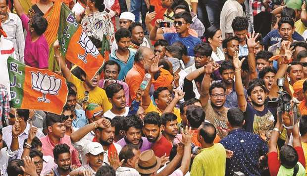Bharatiya Janata Party (BJP) activists chant slogans during a rally in Kolkata to protest against the recent killings of party workers, in Kolkata yesterday.