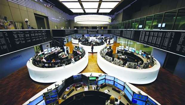 A view of the trading room at the Frankfurt Stock Exchange. The DAX 30 closed 0.4% up at 12,169.05 p