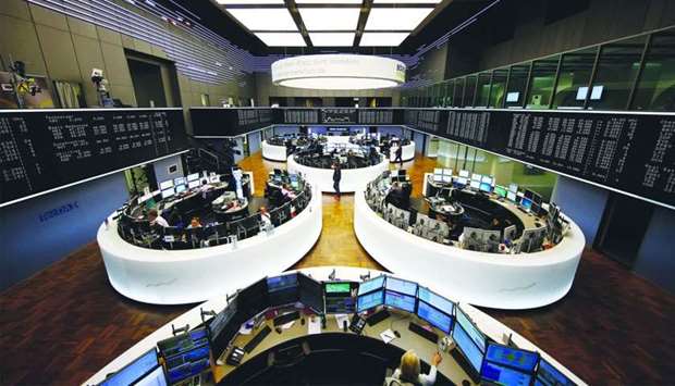 A view of the trading room at the Frankfurt Stock Exchange. The DAX 30 closed 0.4% up at 12,169.05 p