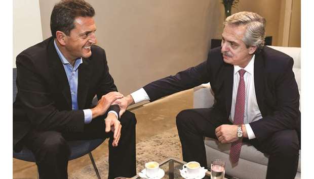 A handout picture released by the Argentinian u2018Frente Renovadoru2019 political party shows presidential pre-candidates Sergio Massa (left) and Alberto Fernandez meeting in Buenos Aires on Wednesday.