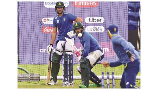 South Africau2019s Faf Du Plessis (centre) and Aiden Markram (left) attend a training session in Cardiff, Wales, on Thursday. (AFP)