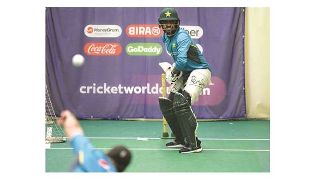 Pakistanu2019s Babar Azam bats during an indoor net session at Old Trafford Cricket Stadium in Manchester yesterday. (AFP)