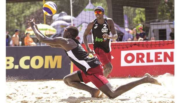 Qataru2019s Ahmed Tijan and Sherif Younis in action during the four-star FIVB Beach Volleyball World Tour in Warsaw, Poland, yesterday.