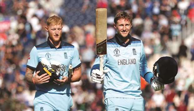 Englandu2019s Joe Root (right) and Ben Stokes celebrate after winning the match against the West Indies yesterday.