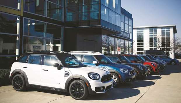 BMW MINI vehicles are displayed for sale at a dealership in Louisville, Kentucky. The US Commerce Department said retail sales rose 0.5% last month as households bought more motor vehicles and a variety of other goods.