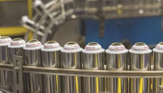Aerosol cans made with tinplate steel at the production plant of Ball Metalpack in Horsham, Pennsylvania. China said yesterday it was raising anti-dumping duties on certain alloy-steel seamless tubes and pipes used at utilities and imported from the US and the European Union.