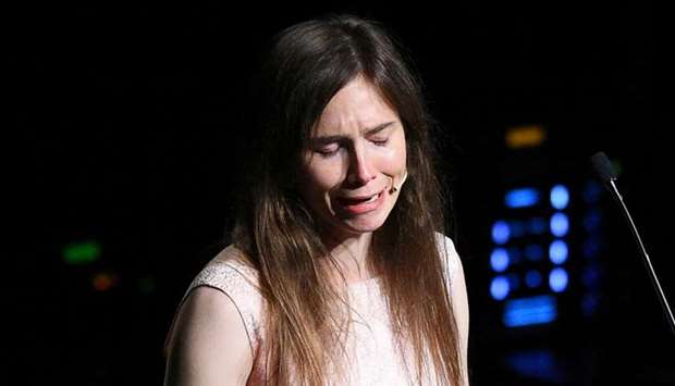 Amanda Knox, who has returned to Italy for the first time since being cleared of the murder of British student Meredith Kercher, cries as she speaks at the Criminal Justice Festival in Modena, Italy